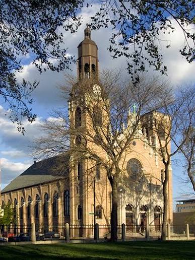 St. Stanislaus Kostka Catholic Church building showcasing historic Catholic architecture, peaceful worship atmosphere, and Christian faith community